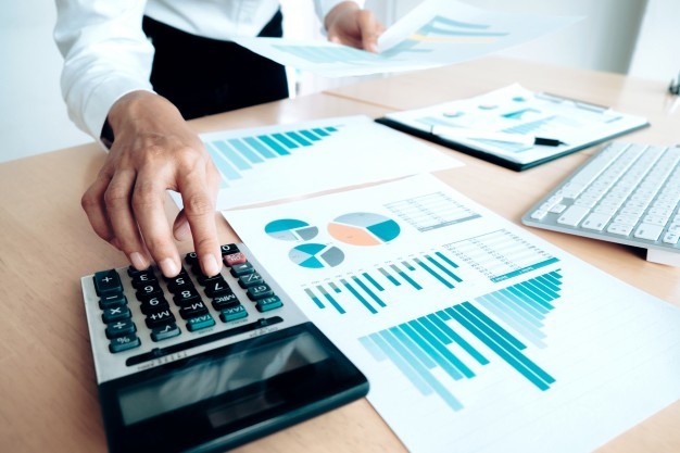 finances-saving-economy-concept-female-accountant-banker-use-calculator_1421-90